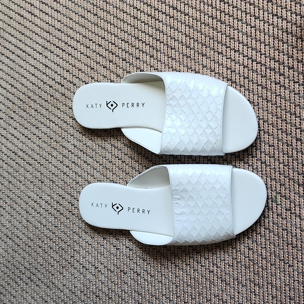 Katy Perry the aqua flat slip on white sandals size 8 for women.